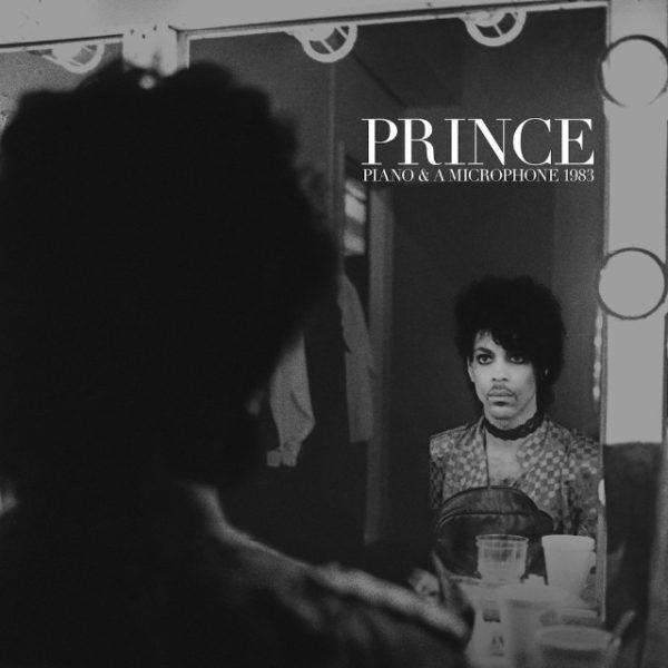 Prince a piano and a microphone